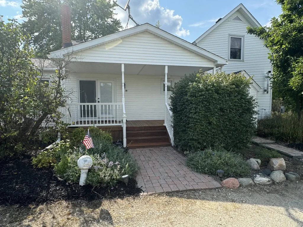 1405 E Blackmore Road, Mayville: farmhouse with porch